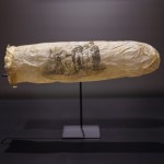 An image of a condom in a museum.