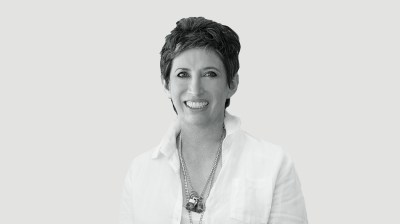Black-and-white portrait of a middle-aged white woman