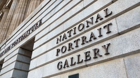 The facade of a building with text reading 'National Portrait Gallery.'