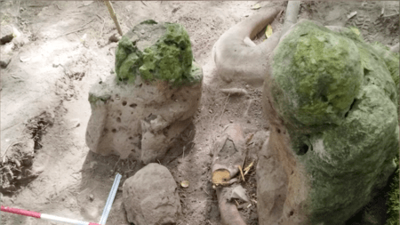 Two anthropomorphic sculptures of an ancestral couple found at Los Abuelos, Guatemala.